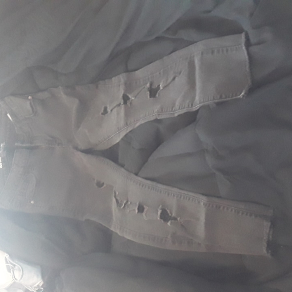 Old Navy  Rockstar  Jean's Black with  Rips and frayed  ankles.